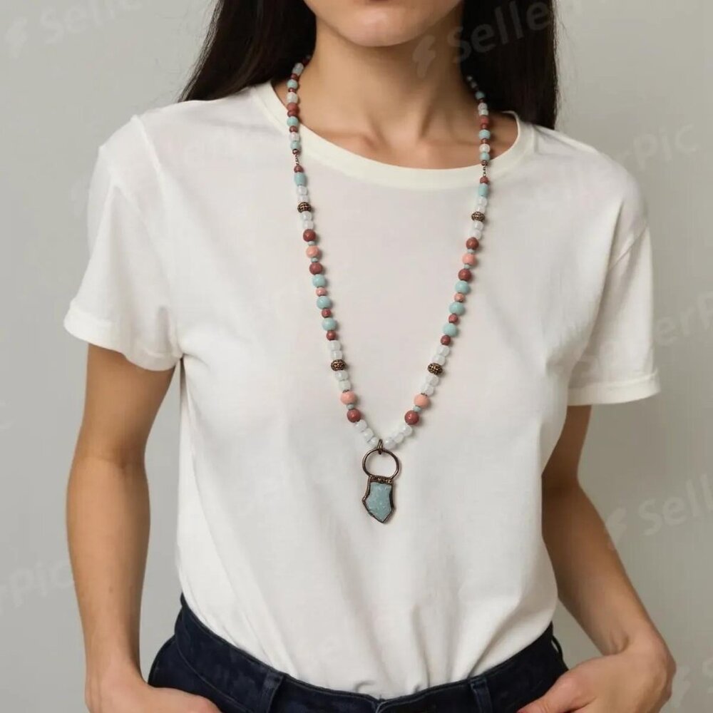 Earthy subtle look, yet still to make a statement. Long beaded necklace. Peach/C